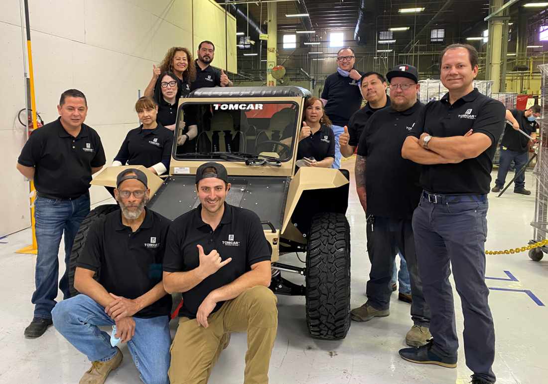 Manufacturing Success! TOMCAR rolls off the production line.