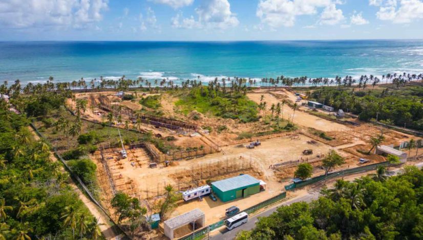 The construction site on the shore of the Caribbean sea. Start building of new all Inclusive resort on a wild tropical beach. Investing and development tourism in the Dominican Republic