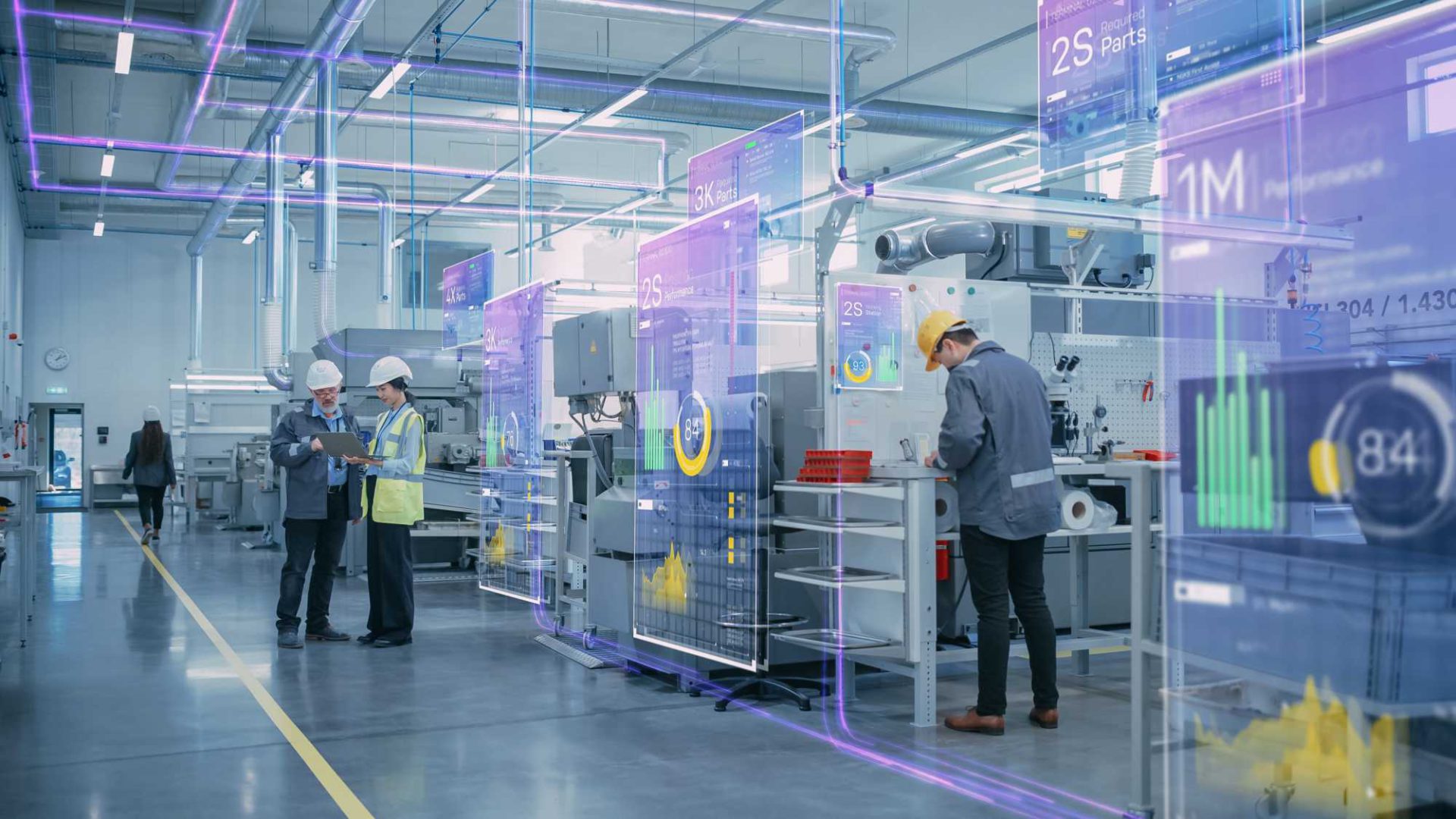 Factory Digitalization: Two Industrial Engineers Use Tablet Comp
