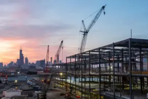 Large data center infrastructure construction project illustrating growing AI power and manufacturing demand